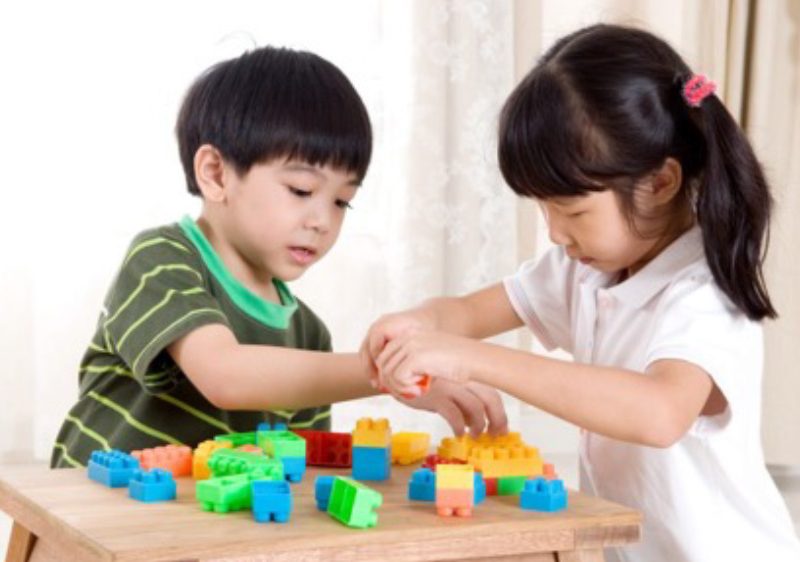 siblings playing together