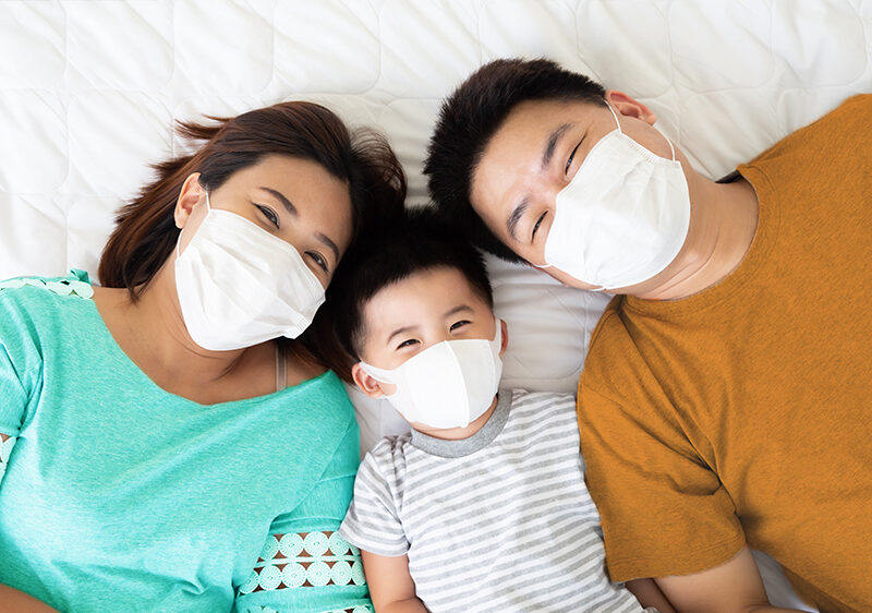 asian family wearing face masks